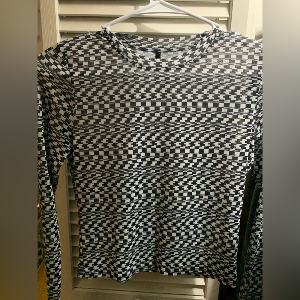 black and white houndstooth patterned sheer top